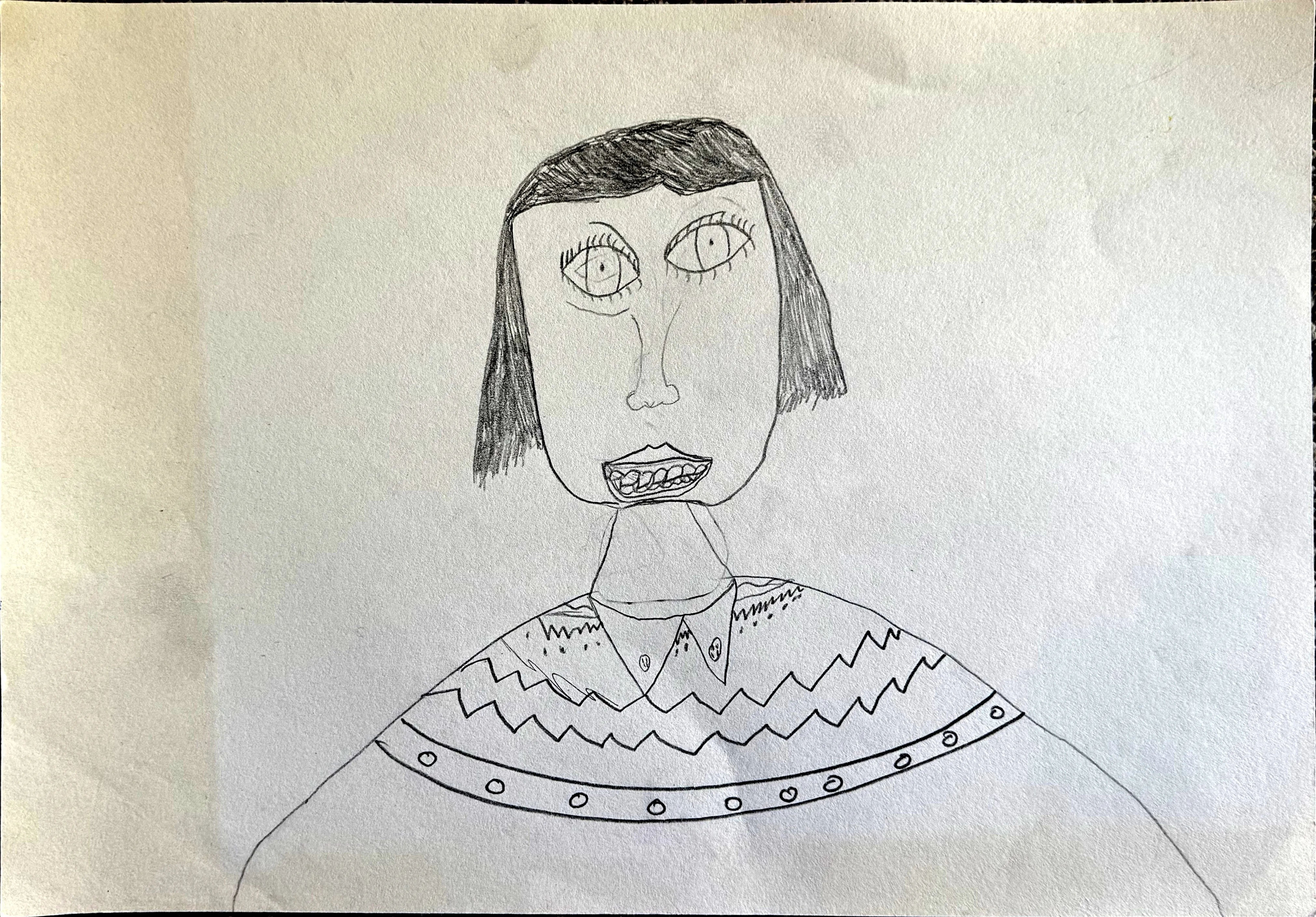 A naive pencil portrait of a person with short dark hair, wide eyes, and an open mouth showing teeth, wearing a decoratively patterned sweater with zigzag and circle motifs.